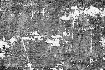 Texture of a concrete wall with cracks and scratches which can be used as a background