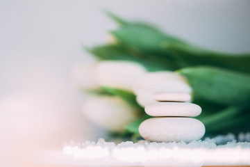 Spa still life with stacked of stone. Holiday, body care and luxury concept. 