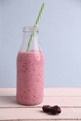blackberry smoothie in color background
