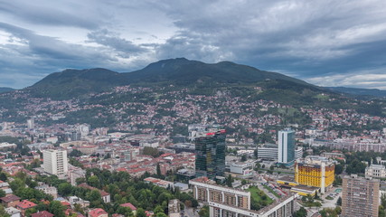 Fototapeta na wymiar Aerial view of the southern part of Sarajevo city day to night timelapse.