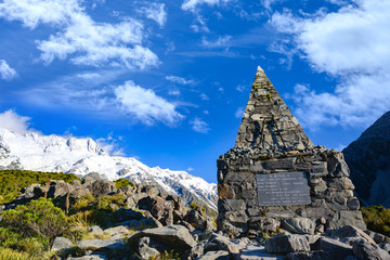 Monument in Mount Cook in memory of those who died in the morning and the blue sky in Mount Cook National Park, Aoraki, New Zealand.