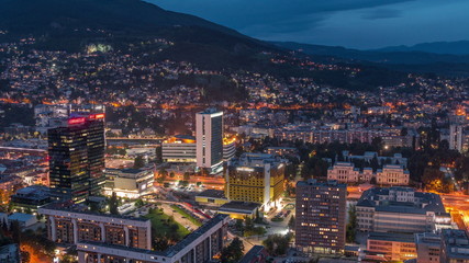 Aerial view of the southern part of Sarajevo city day to night timelapse.