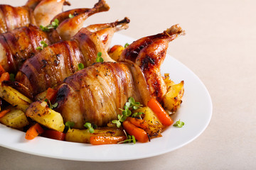 Roast Quails wrapped in bacon