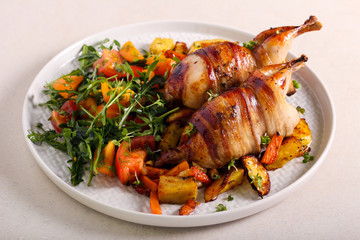 Roast Quail and salad served