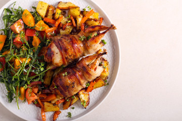 Roast Quail and salad served