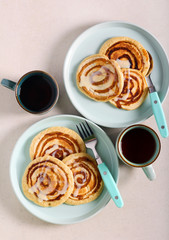 Cinnamon roll pancakes served