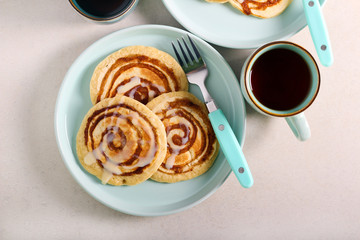Cinnamon roll pancakes served