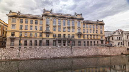 Miljacka river and post office in Sarajevo the capital city of Bosnia and Herzegovina timelapse...