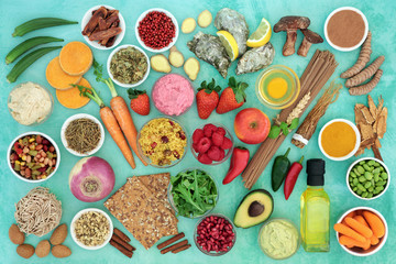 Health food for a healthy diet concept with foods & herbal medicine high in antioxidants,...