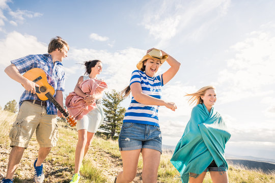 Group of friends hanging out in the foothills having fun. Bridger, Montana, USA