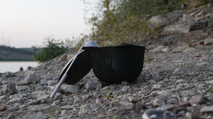 Delicious soup in a cauldron on the nature