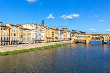 Fototapeta na wymiar View of the Arno River with the Ponte Vecchio bridge in Florence, Italy