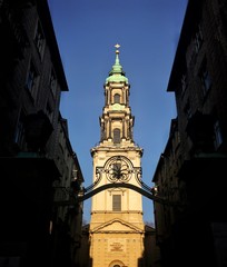 church between buildings 