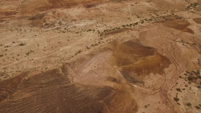Flying over dry river beds and colored sands of Negev Desert. DJI-0210-11