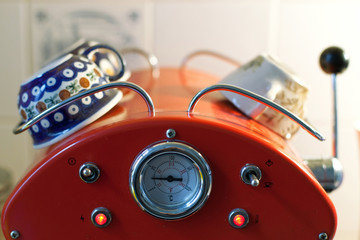 detail of the display vintage style red coffee machine