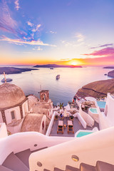 Amazing evening view of Santorini island. Picturesque spring sunset on the famous Greek resort Fira, Greece, Europe. Traveling concept background. Artistic style post processed photo. Summer vacation - obrazy, fototapety, plakaty