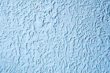 Texture of a rough blue surface. Decorative putty