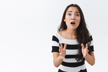Upset, disappointed good-looking east-asian girl feeling reckless and sad as seeing bad results,...