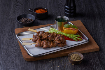 Mala meat grill mixing with chilli powder serve with potato fries