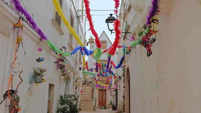 Walking charming white streets of Locorotondo in Puglia, Italy