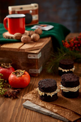 Moist chocolate brownie and persimmon on Christmas theme