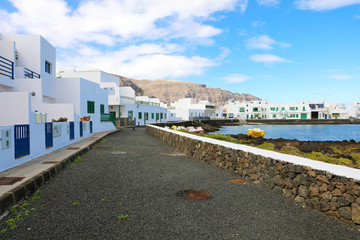 Fototapeta na wymiar Orzola village with white houses in Lanzarote, Canary Islands, Spain