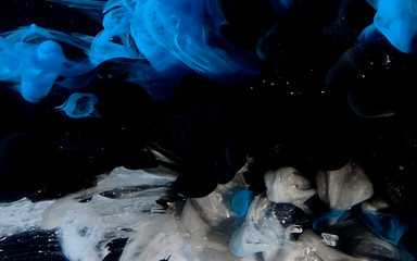 Estonia colored flag on black background. Abstract background.