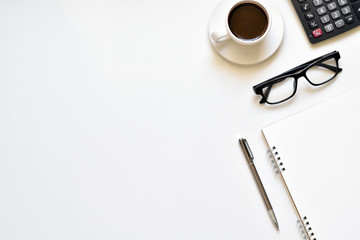 Flat lay style, Top view office desk create on white background with copy space has notebook, pen,...