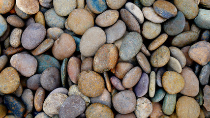pebbles on the beach background. stone garden
