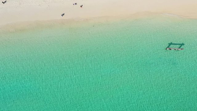 Footage B-roll of Aerial view ocean waves, beach and rocky coastline and beautiful forest. Nyaung Oo Phee Island Myanmar Tropical seas and islands in southern Myanmar. Beautiful tourist attractions.