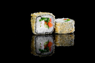 tempura roll with salmon on a black background with insulation and reflection