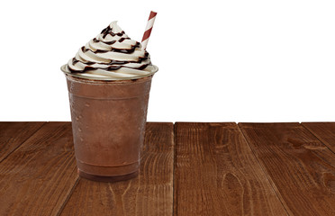 Frappuccino or Iced coffee with cream and chocolate sauce in takeaway cup isolated on white background