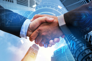 Partnership. business man handshake with digital network link connection, graph chart of stock...