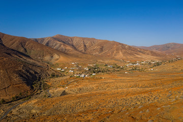 Impressive landscapes of volcanic Fuerteventura. Viewpoint Betancuria mirador, Canary islands, Spain. Aerial drone view in october 2019