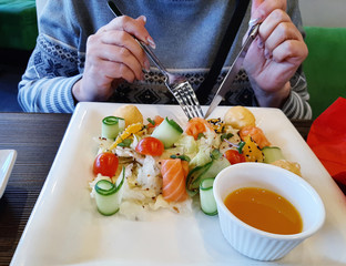 vegetable and salmon salad on a plate