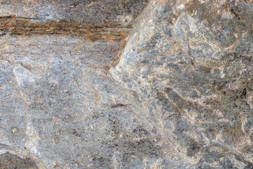 Grey flat textured limestone close up