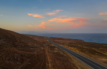 Fuerteventura, Canary Islands, Spain, october 2019: Aerial drone view on coastline at sunset.