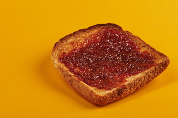 Side view of toast with jam