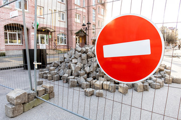 no traffic sign on the background of a pile of stones on the street