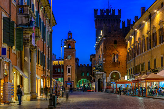 Old street with Pallazzo Communale (Palazzo Municipale) at night in Ferrara, Emilia-Romagna, Italy. Ferrara is capital of the Province of Ferrara