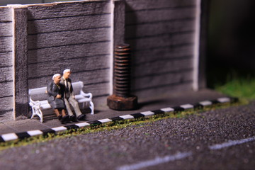 illustration photo for romantic memorable moment, Old Couple Mini figure Toy sit at white chair 

