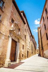 Fototapeta na wymiar Cozy medieval street in the city Toledo, Spain