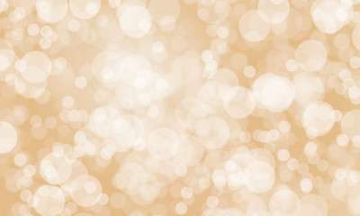 abstract blurred gold color background with light bokeh
