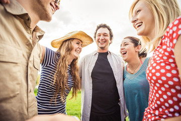 Group of young adults having fun dancing at a picnic party. Bridger, Montana, USA