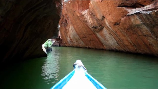 Small boat sailing on San Francisco River Canyon, Sergipe, Brazil