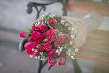 Close-up flower view(pink, red rose)that is beautifully decorated as a bouquet, placed on the table or garden to give on special days(Valentine,wedding)