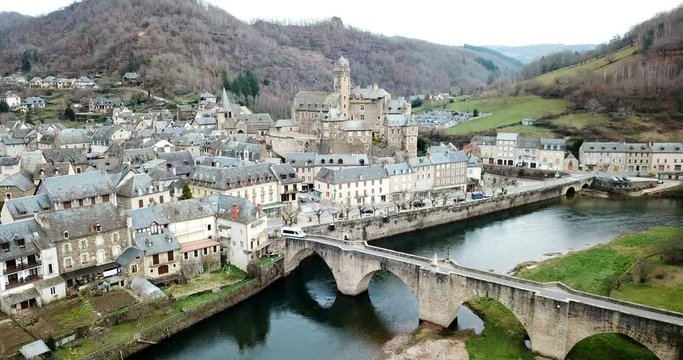 Picturesque view of French medieval village Estaing on Lot river