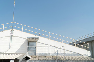 Obraz premium White brick wall and silver zinc entry door