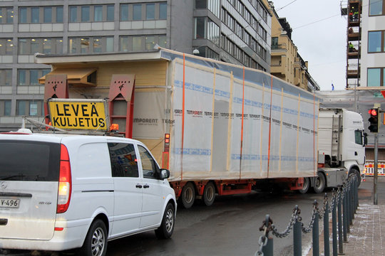 Escort Vehicle And Wide Load Truck Transport.  Illustrative Editorial Content.