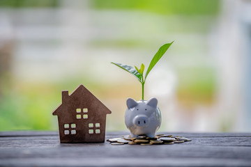 Saving money for buy a new house for plan business investment of real estate concept.